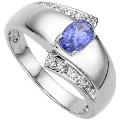 A truely marvelous handcrafted and unique Oval Cut 0.41 carat  genuine Egyptian Blue Tanzanite and two small Round Cut Genuine white Diamonds on a solid 925 sterling silver solitaire ring.