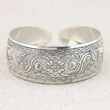 A smashing Antique Style German Silver Adjustable Lucky Flower, design Bangle.  This smart, yet chunky adjustable bangle would look amazing on any wrist.