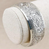 A smashing Antique Style German Silver Adjustable Lucky Flower, design Bangle.  This smart, yet chunky adjustable bangle would look amazing on any wrist.