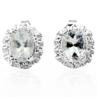 Nice 1.938 CT Oval Cut Aquamarine gemstone with a fine Diamond border, Sterling Silver Stud Earrings for pierced ears.