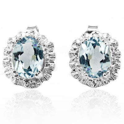 2.838 ct Blue Topaz with a fine border of Diamonds, Sterling Silver Stud Earrings