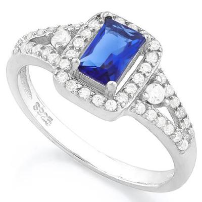 A truly mesmerizing! 0.7 Carat Created Blue Sapphire and 0.46 Carat TW (46 pieces) Flawless Created Diamond mounted on a Solid 925 Sterling Silver Halo Ring.