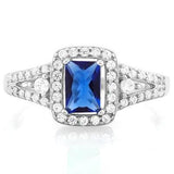 A truly mesmerizing! 0.7 Carat Created Blue Sapphire and 0.46 Carat TW (46 pieces) Flawless Created Diamond mounted on a Solid 925 Sterling Silver Halo Ring.