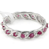 An unusual 0.732 carat total weight (16 pieces) Genuine Ruby, Platium over 925 Sterling Silver Eternity Ring