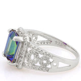 A stunningly eye catching 2.06 ct Emerald Cut Ocean Mystic Topaz & four Round Cut Genuine White Diamonds on a Solid  925 Sterling Silver Ring.