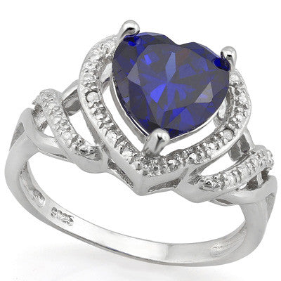 A truely awesome 4.462 carat (total weight) Laboratory Created Heart Cut Tanzanite and Genuine Round Cut White Diamonds, Solid 925 Sterling Silver Ring