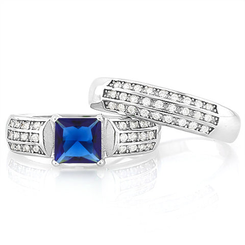 A beautiful 1.5 Carat Created Blue sapphire and 2.41 Carat total weight (54 pieces) Diamond Solid 925 Sterling Silver Halo Rings. This set of two stacking rings looks amazing for the price and would make a lovely gift.