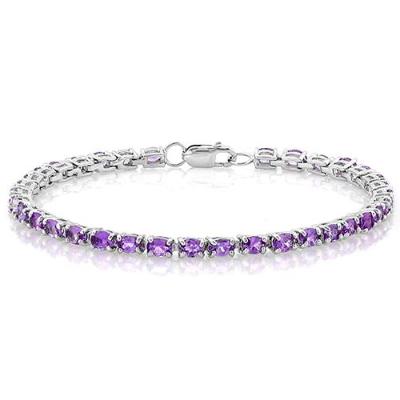 A stunning handcrafted, yet fine 6.010 Carat (total gemstone weight), 36 Oval Cut Genuine Floral Lavender Amethyst on a Solid Sterling Silver Tennis Bracelet.