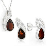 A beautiful Garnet and Diamond Solid Sterling Silver Jewellery Set, comprising of a nice pair of Stud Earrings, Pendant and matching 18" Chain. A whooping 2 1/5 Carat (Total Weight) Garnet, 925 Solid Sterling Silver Jewellery Set.